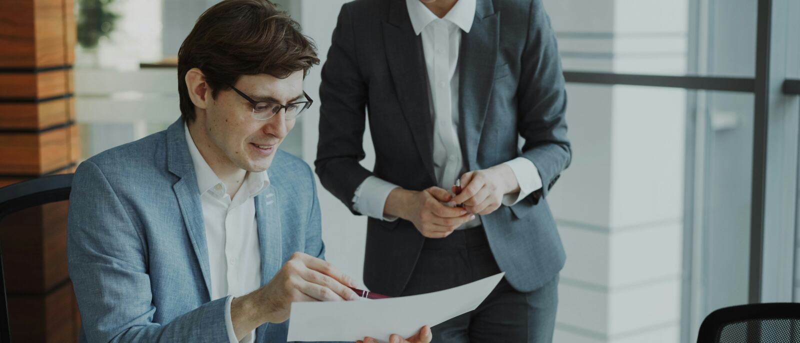 Two professionals in a consultation meeting